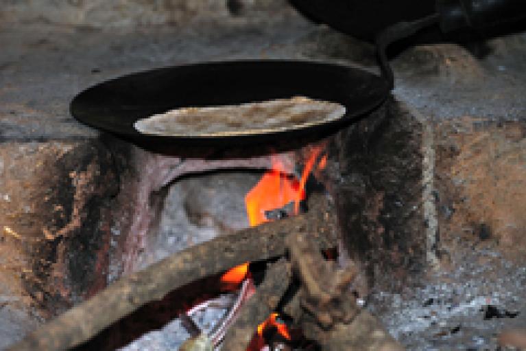 Cooking over a wood-fired stove
