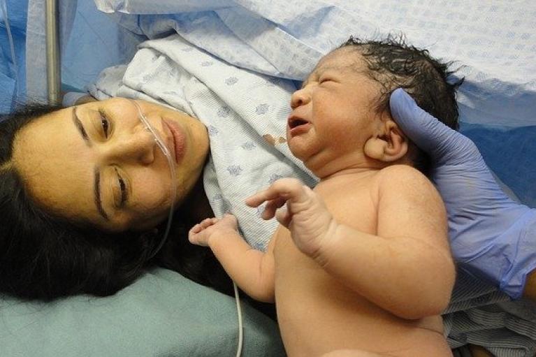Newborn baby and mother
